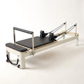 Pilates Reformer Built for Home Studios, Foldable Design, 4 Adjustable Springs, 400 LB Capacity