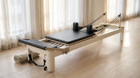 Pilates Reformer Foldable, Suitable for Intermediate and Beginners Users, Pilates Equipment for Home Gym Studio Use with 4 Adjustable Resistance Spring, up to 400 LBS — Lifestyle