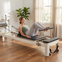 Pilates Reformer Foldable, Suitable for Intermediate and Beginners Users, Pilates Equipment for Home Gym Studio Use with 4 Adjustable Resistance Spring, up to 400 LBS — Lifestyle